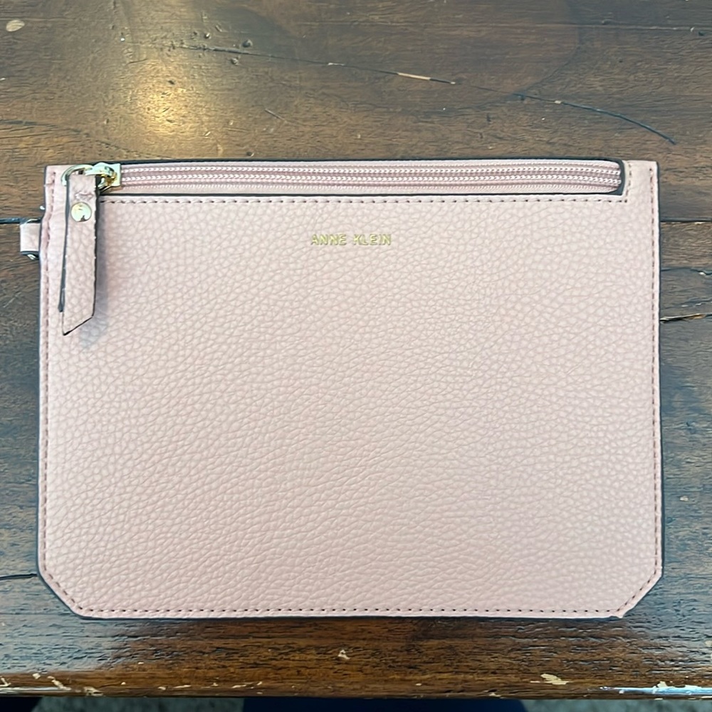 Pink zipper pouch.